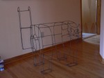 A contour drawing in steel rod.
