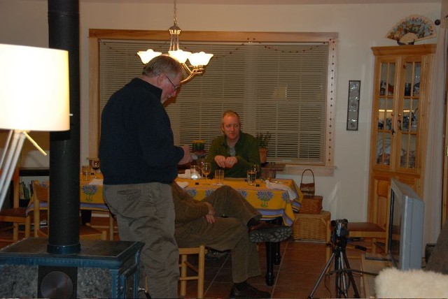 Arden at home with Mark at table.